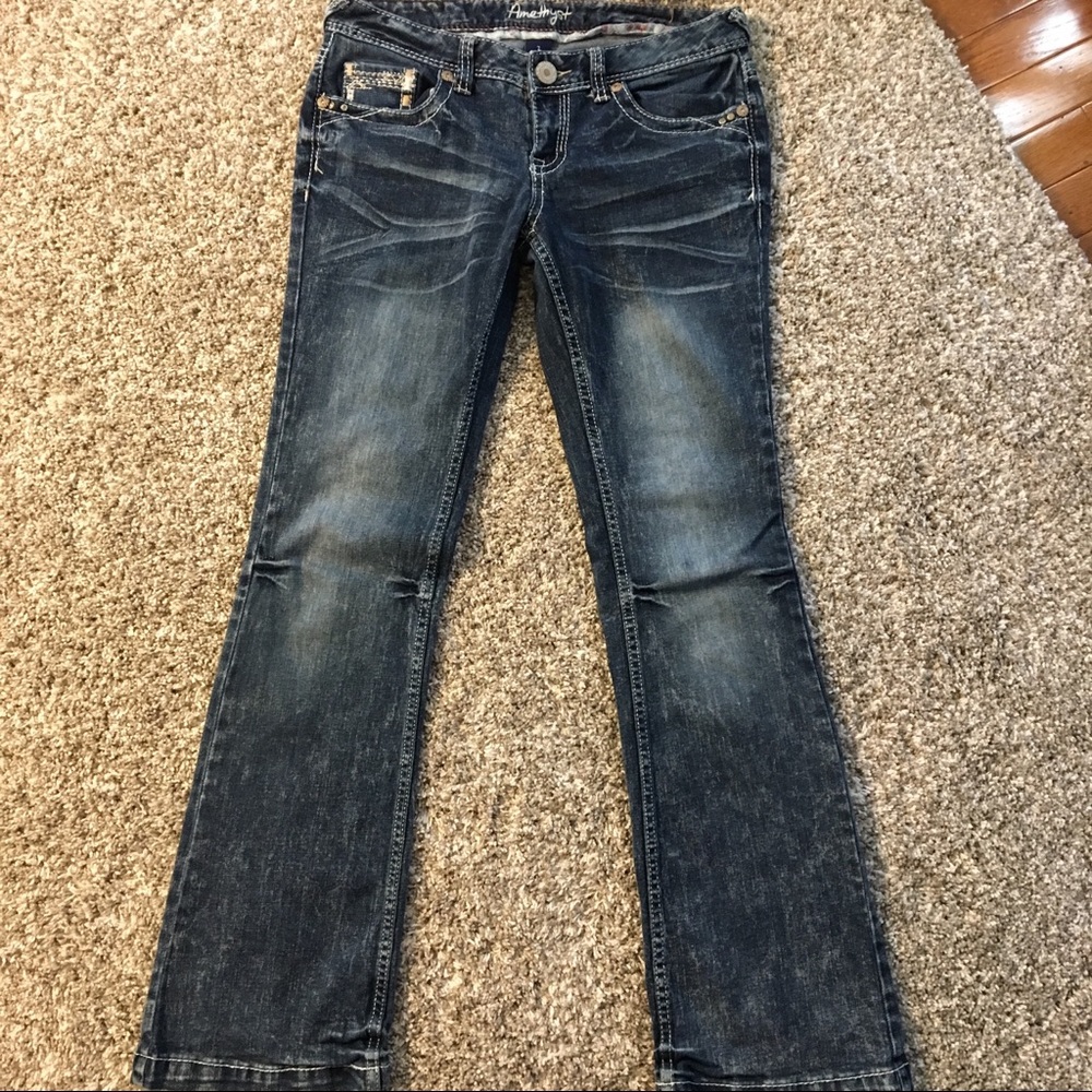 Acid washed amethyst blue jeans. Cute and trendy!